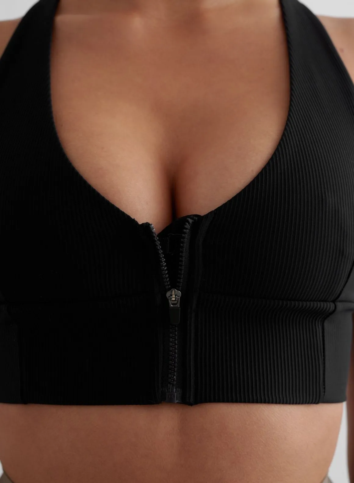 Black Ribbed Performance Zipped Bra