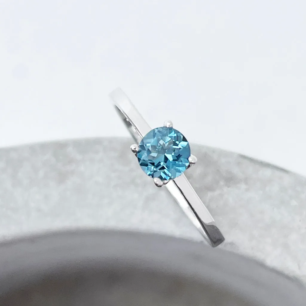 Delicate Solitaire London Blue Four Claw White Gold Ring
