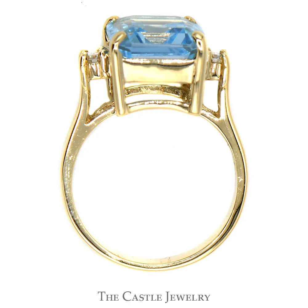 Emerald Cut Blue Topaz Ring with Round Diamond Accents in 14k Yellow Gold