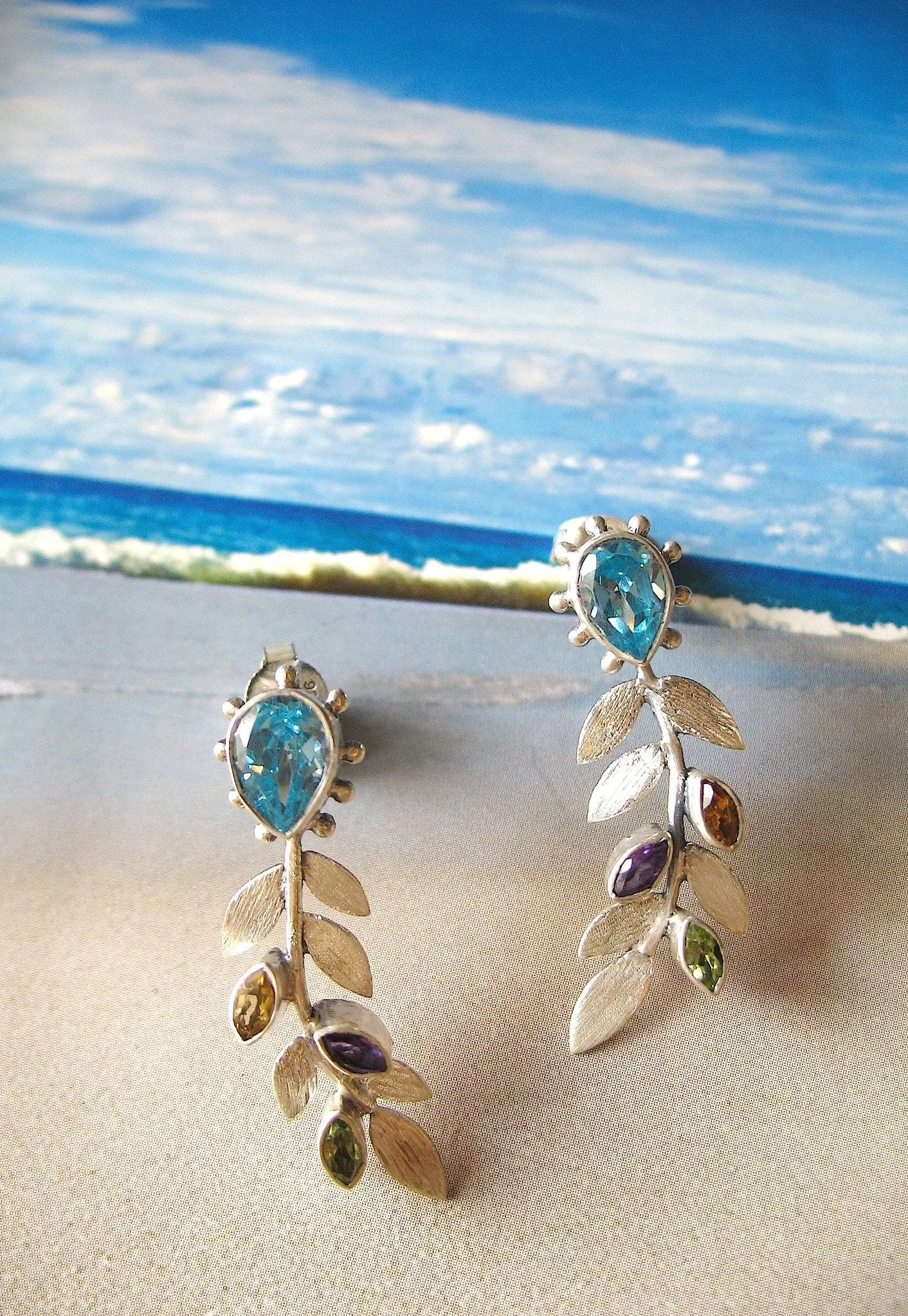 Exquisite, multi-color gemstone leaf earrings in brush finish