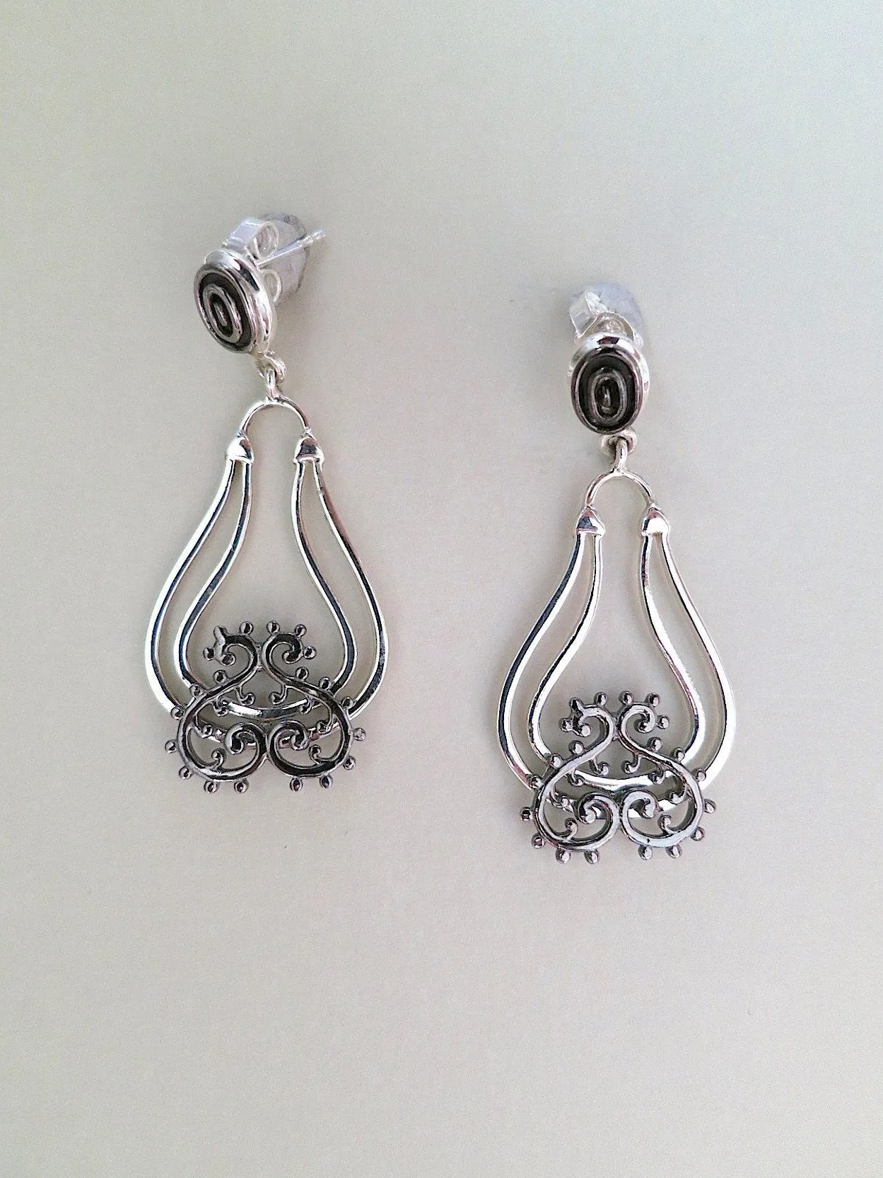 Gorgeous, dangle drop earrings with mehndi inspired black rhodium plated detailing
