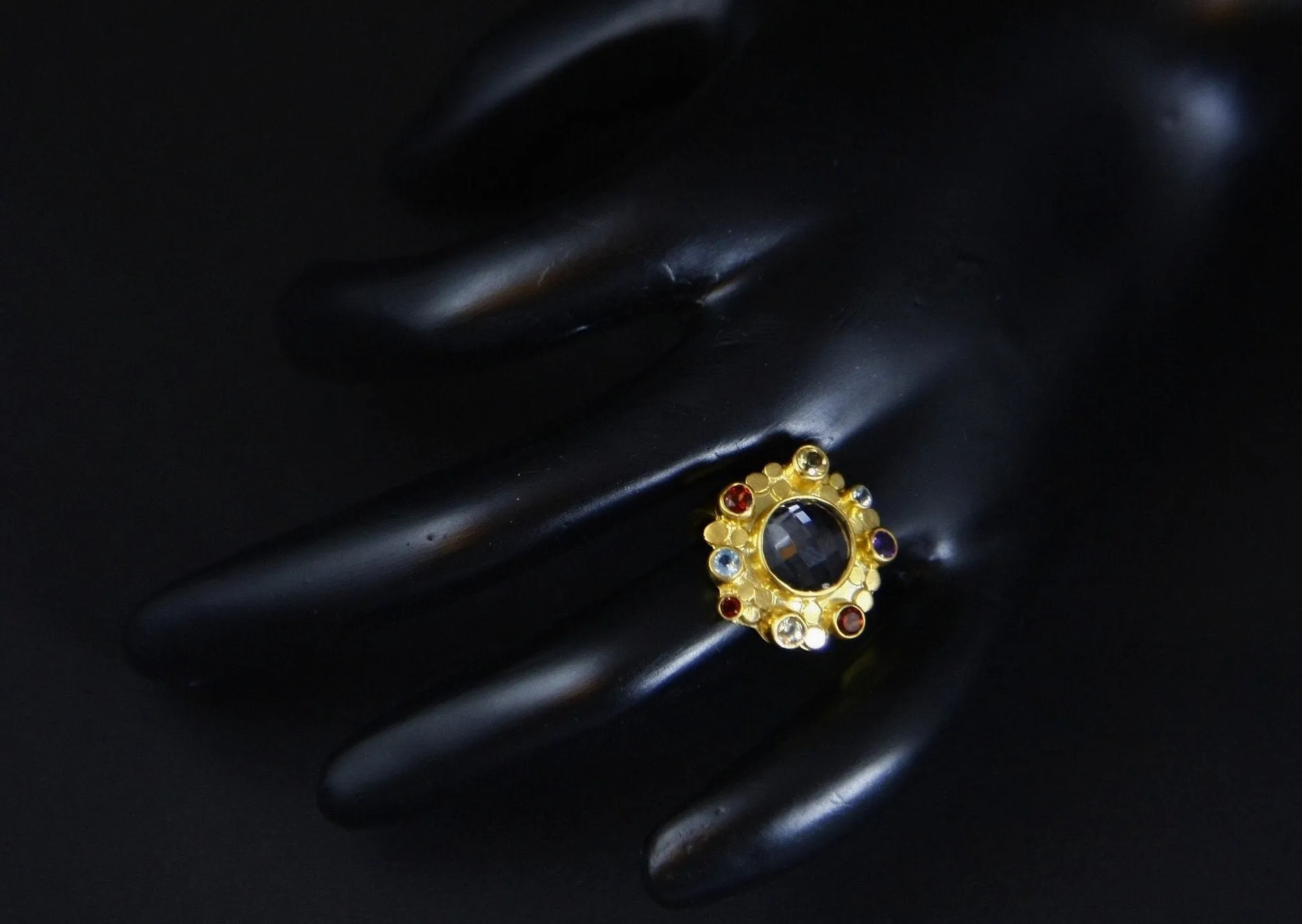 Gorgeous, faceted rock crystal and multi-color gemstones ring