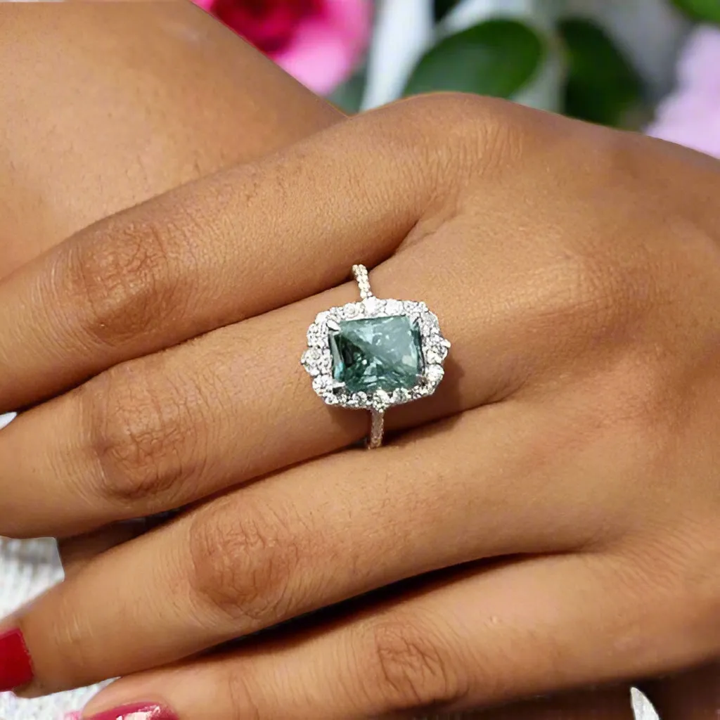 Gorgeous Halo Radiant Cut Cyan Blue Engagement Ring