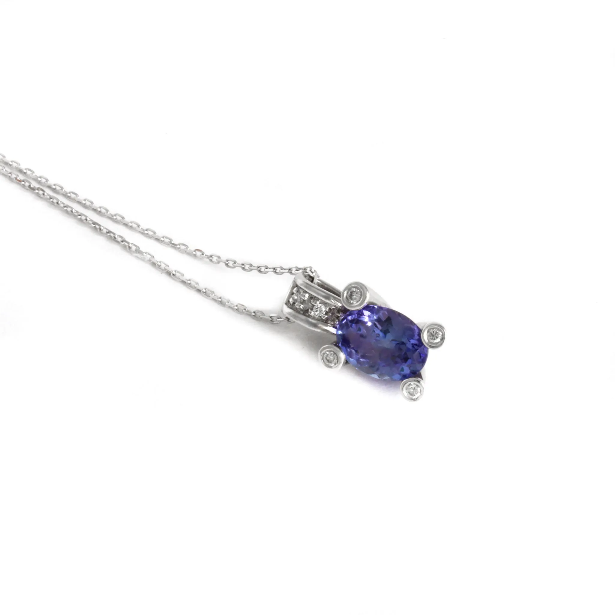 Gorgeous Oval Cut Tanzanite with Diamond Claw, Bale and Band Accent Pendant