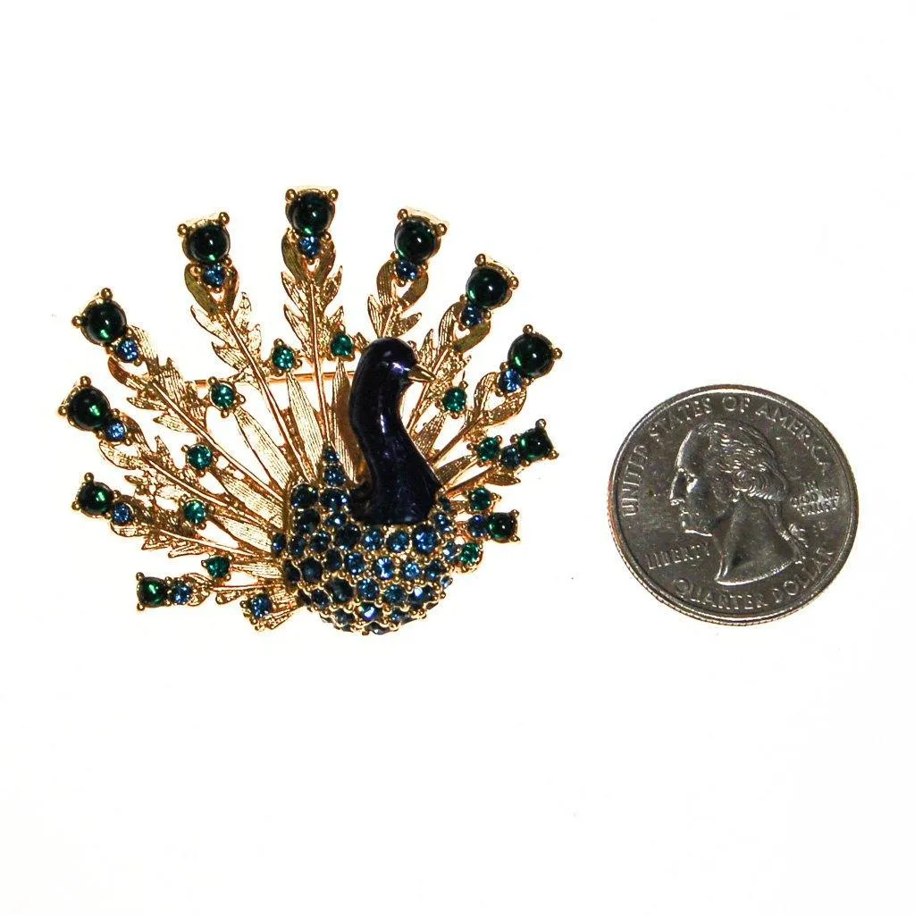 Joan Collins Jeweled Peacock Brooch