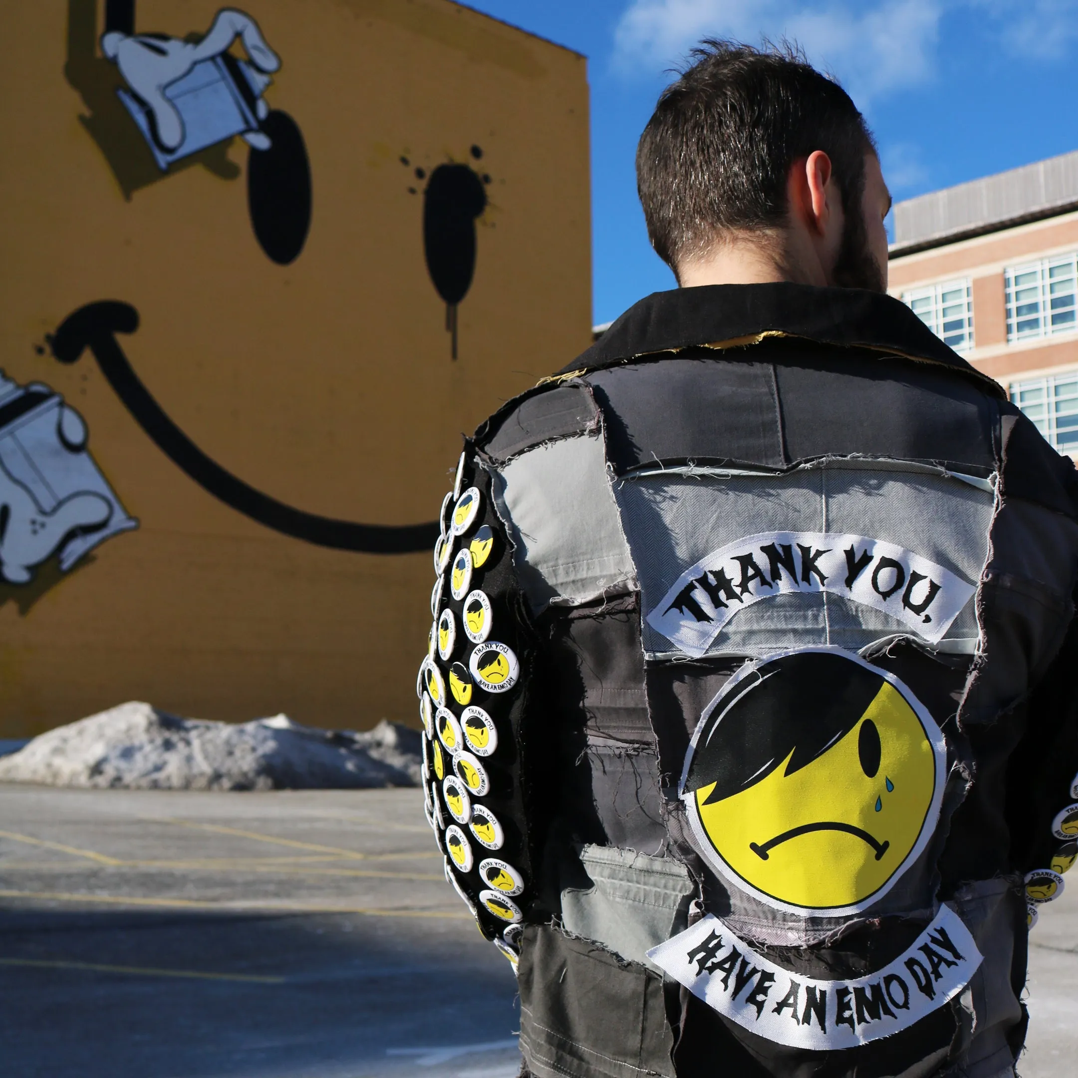 Misery Business - Upcycled denim moto jacket with pin sleeves